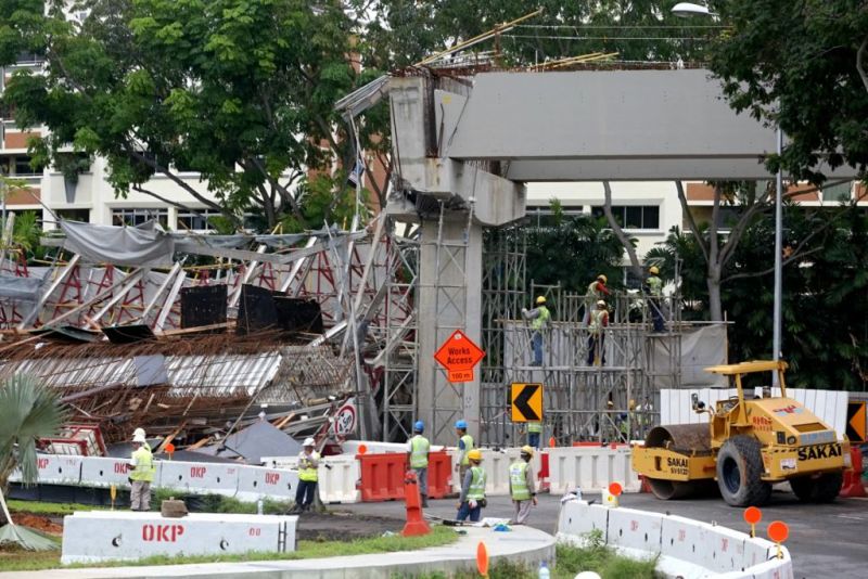 The collapsed viaduct yesterday (July 14). Preliminary investigations show that the corbels underneath the workers suddenly gave way, sending them crashing down. u00e2u20acu2022 Picture by Nuria Ling/TODAY