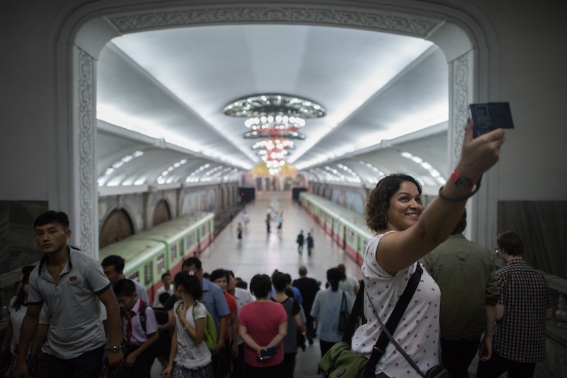 A tourist takes a selfie during a visit to a subway station in Pyongyang on July 23, 2017.u00e2u20acu201d AFP pic