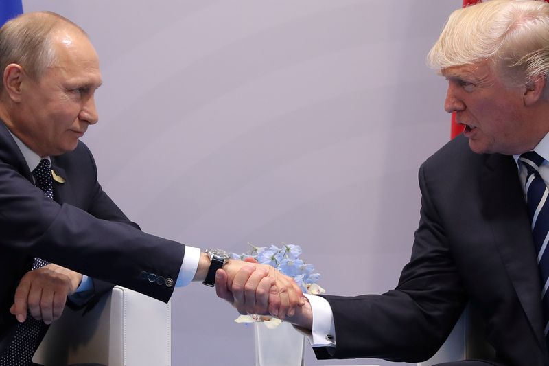US President Donald Trump shakes hands with Russian President Vladimir Putin during their bilateral meeting at the G20 summit in Hamburg, Germany July 7, 2017. u00e2u20acu201d Reuters pic