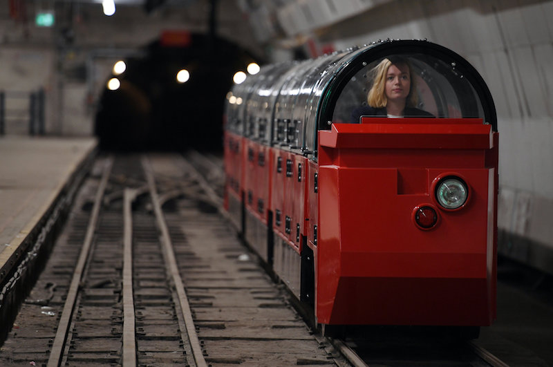 A museum worker sits in a battery-powered train on the Mail Rail tracks of the Mount Pleasant Sorting Office underground station in London August 7, 2017. u00e2u20acu201d Reuters pic