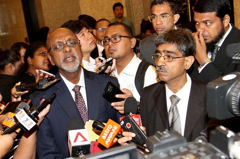 Lawyers Mohamed Haniff Khatri and Sivarasa Rasiah speak to reporters after the BNM 1990s Forex Losses RCI's opening session at the Court of Appeal in Putrajaya Aug 8, 2017. u00e2u20acu201d Picture by Miera Zulyana