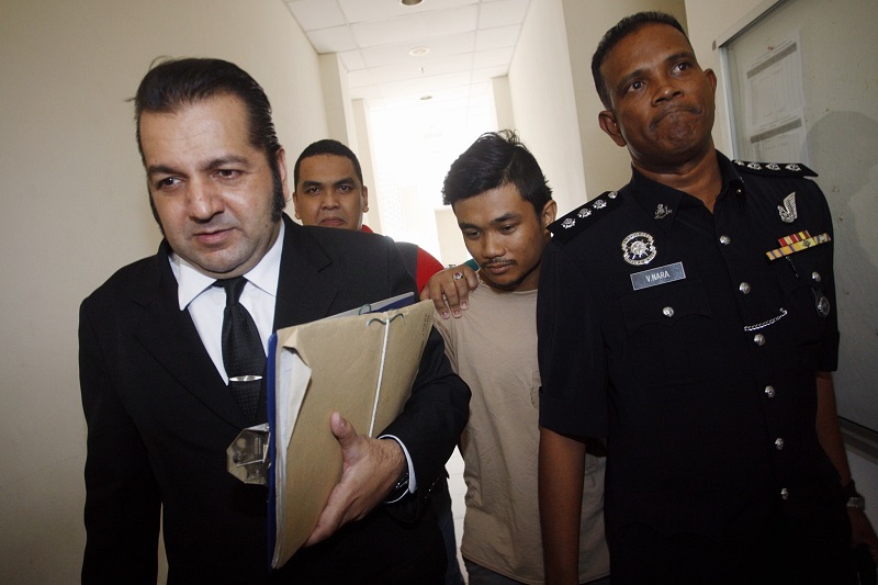 Suraj (left), a well-known Elvis Presley impersonator, later told Malay Mail that he was glad it was over after three years.