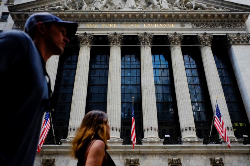 People walk by New York Stock Exchange in the financial district in New York, US, August 10, 2017. u00e2u20acu201d Reuters pic