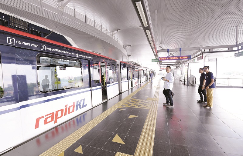 A train pulls up at the station. u00e2u20acu201d Picture by Malay Mail