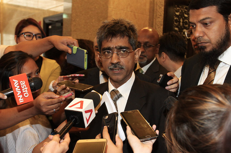 Lawyer for Tun Dr Mahathir Mohamad, Mohamed Haniff Khatri, speaks to reporters outside the Court of Appeal afteru00c2u00a0the BNM 1990s Forex Losses RCIu00e2u20acu2122s second hearing in Putrajaya, August 21, 2017. u00e2u20acu201d Picture by Miera Zulyanau00c2u00a0