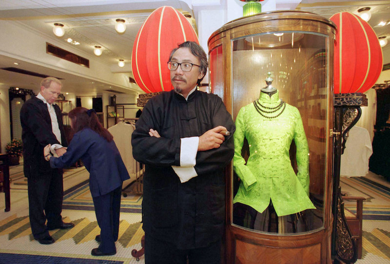 Businessman and socialite David Tang looks over his nostalgic, upmarket Chinese emporium 'Shanghai Tang' in Hong Kong February 10, 1999. u00e2u20acu201d Reuters pic