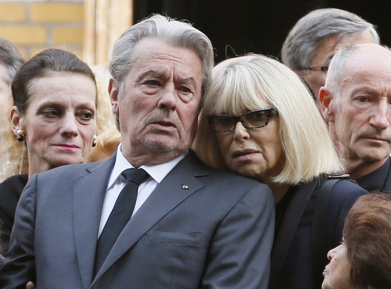 This file photo taken on September 20, 2012 shows French actor Alain Delon (left) and French actress Mireille Darc outside the Saint-Honore d'Eylau church, in Paris. u00e2u20acu201d AFP pic 