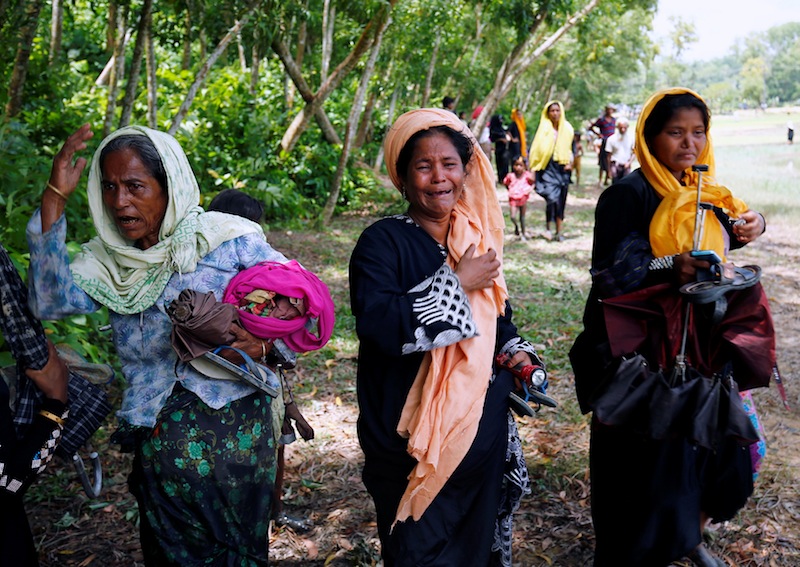 Rohingya women cry after being restricted by members of Border Guards Bangladesh (BGB) to further enter into Bangladesh, in Coxu00e2u20acu2122s Bazar, Bangladesh August 28, 2017. u00e2u20acu201d Reuters pic
