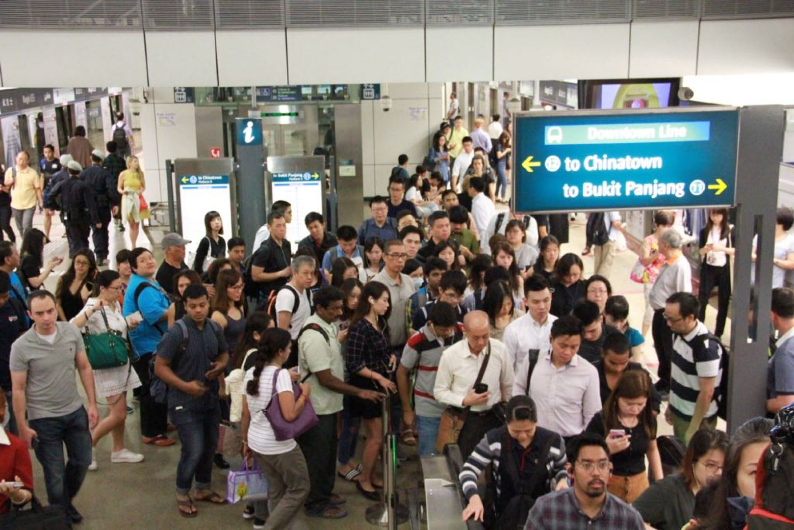 Early morning commuters on Friday were hit by twin disruptions on the train network, as signalling faults disrupted the entire Downtown Line for about 35 minutes and caused major delays on the North-South Line. u00e2u20acu201d Picture by Esther Leong