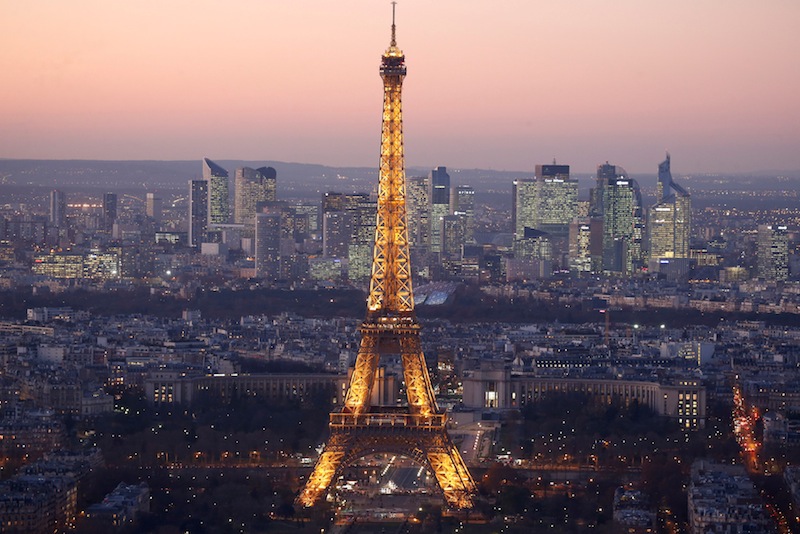 A view of the illuminated Eiffel Tower and the skyline of La Defense business district (Rear) at night in Paris, France, November 28, 2016. u00e2u20acu201d Reuters pic