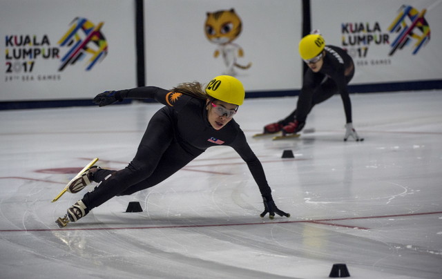 National ice skating athlete Anja Chong An Ya (left) clinched gold in the 29th SEA Games women's short track speed skating 500m final at Empire City Mall Ice Arena in Damansara Perdana today. u00e2u20acu201d Bernama pic