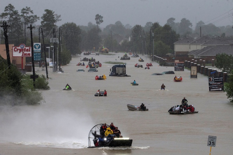 Residents use boats to evacuate flood waters from Tropical Storm Harvey along Tidwell Road east Houston, Texas, August 28, 2017. u00e2u20acu201d Reuters pic