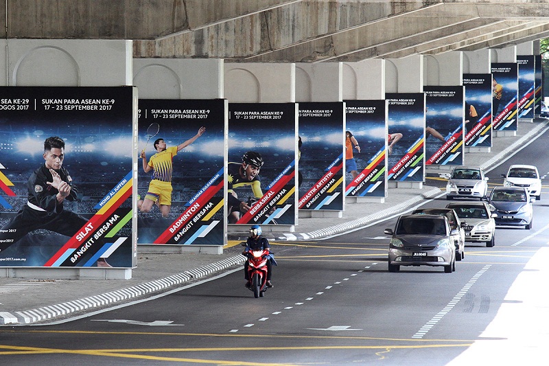Billboards featuring athleteu00e2u20acu2122s picture can be seen along the road nearby KL Sport City in Bukit Jalil ahead of KL 2017 Sea Games in Selangor Aug 7, 2017. u00e2u20acu201d Picture by Miera Zulyana