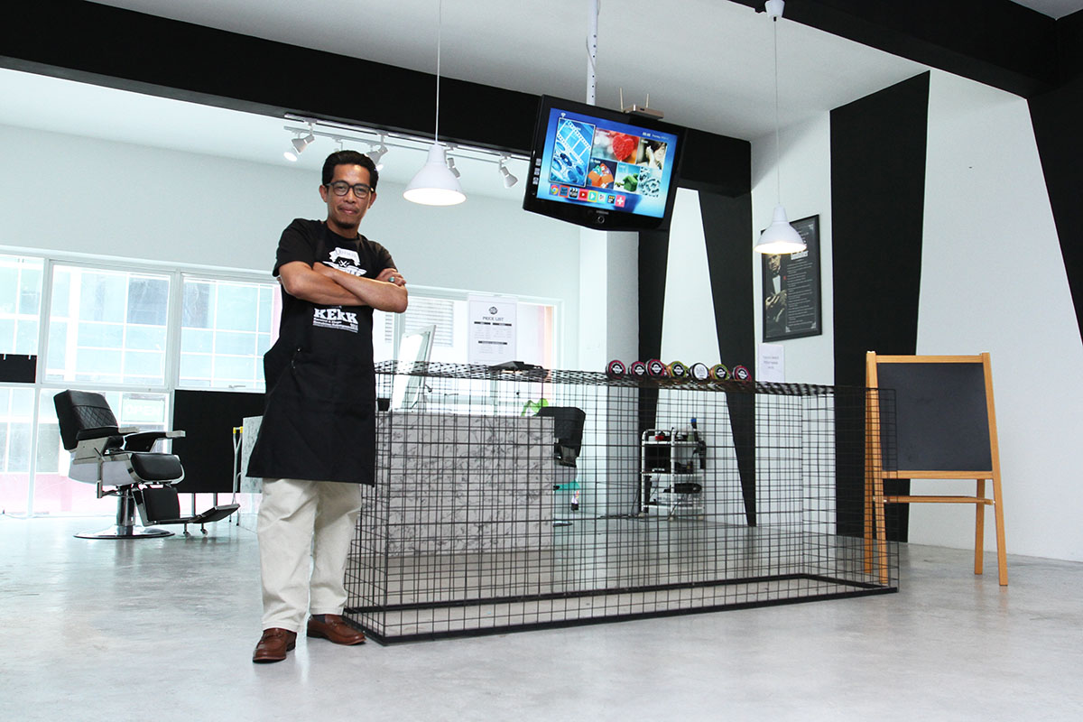 TN Winda Mohd Tahir, owner of BlackWhite Barbershop posing with his tools during special interview at BlackWhite Barbershop, Ara Damansara on August 30, 2017. u00e2u20acu201dPicture by Miera Zulyanann