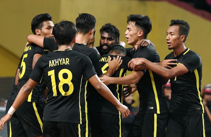 N. Thanabalan celebrates with his teammates at the Shah Alam Stadium, August 26, 2017. u00e2u20acu201d Reuters pic