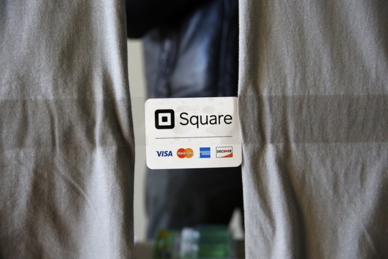 An advertisement for the Square payment processor is seen outside a vendors site along the High Line in New York March 9, 2016. u00e2u20acu201d Reuters pic 