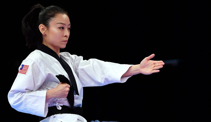 Malaysian Taekwondo athlete Yap Khim Wen in action to win a gold medal in Women's Poomase Individual final at Kuala Lumpur Convention Centre today. u00e2u20acu2022 Bernama pic