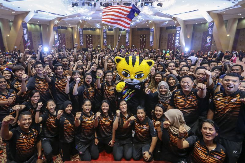 The Malaysian SEA Games Contingent posing for pictures after the flag handing-over ceremony at Putrajaya International Convention Centre, August 10, 2017. u00e2u20acu201d Picture by Yusof Mat Isa