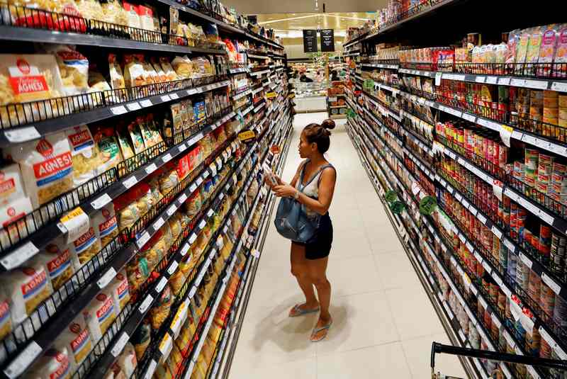A customer shops inside the Gourmet Market in Bangkok May 20, 2017. u00e2u20acu201d Reuters pic