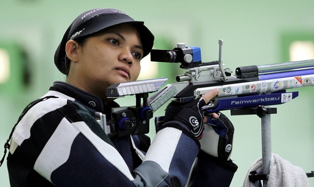 Nur Suryani Mohd Taibi of the Malaysian Armed Forces (ATM) calms herself during the womenu00e2u20acu2122s 10m Air Rifle individual event in the Tun Hanif Trophy competition at the National Shooting Range in Subang September 6, 2015. u00e2u20acu201d Bernama pic