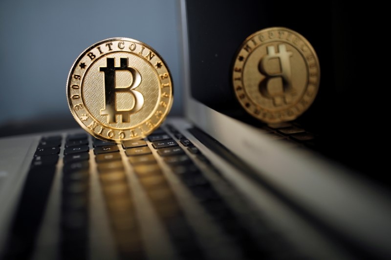 A Bitcoin coin is seen in an illustration picture taken at La Maison du Bitcoin in Paris June 23, 2017. u00e2u20acu201d Reuters pic