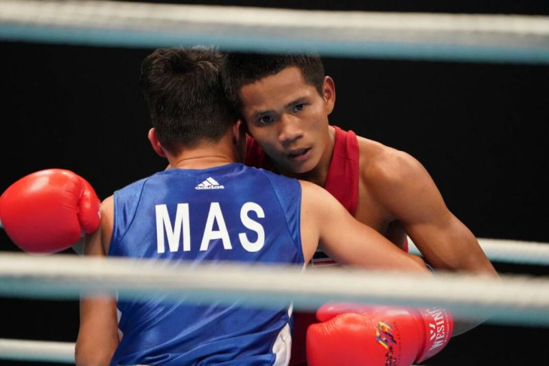 Mohamed Fuad Redzuan (in blue) has won the SEA Games light-fly weight (49kg) category final. u00e2u20acu2022 Picture via Twitter/kl2017