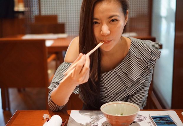 Cheryl Wee, 30, prefers timeless classics and says the ruffled statement top is the trending style now. — Handout via TODAY