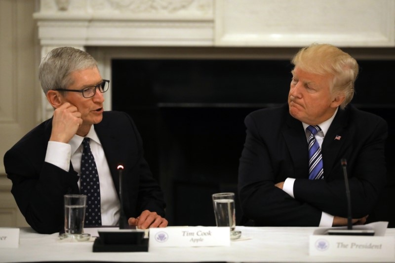 US President Donald Trump listens as Tim Cook, CEO of Apple speaks during an American Technology Council roundtable at the White House in Washington June 19, 2017. u00e2u20acu201d Reuters pic