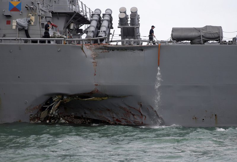 A damaged part of the US Navy guided-missile destroyer USS John S. McCain is seen in Singapore waters after a collision August 21, 2017. u00e2u20acu201d Reuters pic
