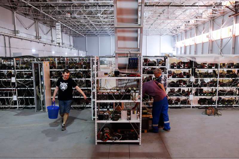 Russia's crypto-businessman Dmitry Marinichev's virtual currencies mining farm operates in a former Soviet-era car factory warehouse in Moscow. u00e2u20acu201d AFP picn