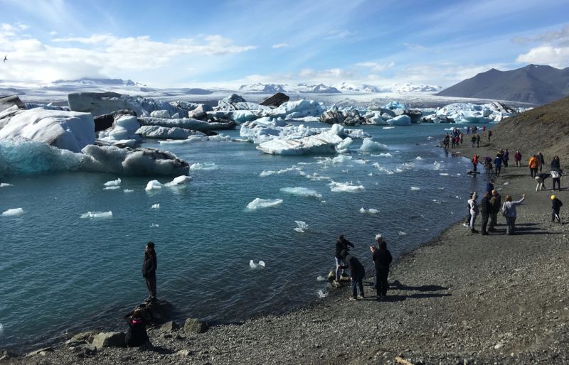Tourists at the Jokulsarlon, a glacier lagoon in southern Iceland where ice bergs breaking off from the Breidamerkurjokull glacier have formed the countryu00e2u20acu2122s deepest lake in the last 80 years, on July 4, 2017. u00e2u20acu201d Thomson Reuters Foundation pic