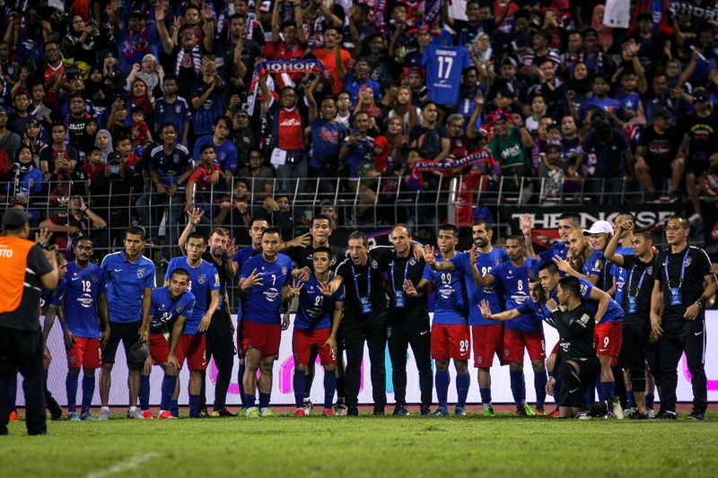 Johor Darul Tak'zim players (JDT) are pictured with JDT fans after the 2017 Super League match against Selangor at the Selayang Municipal Council Stadium, August 5, 2017. u00e2u20acu201d Bernama picn