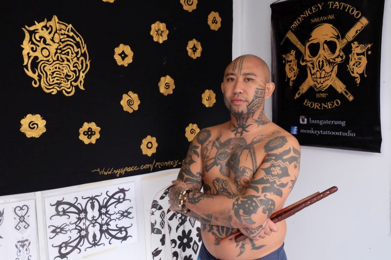 Sarawakian tattoo artist Jeremy Lo draws inspiration from Borneo tribal tattoos. u00e2u20acu201d Picture by KE Ooi