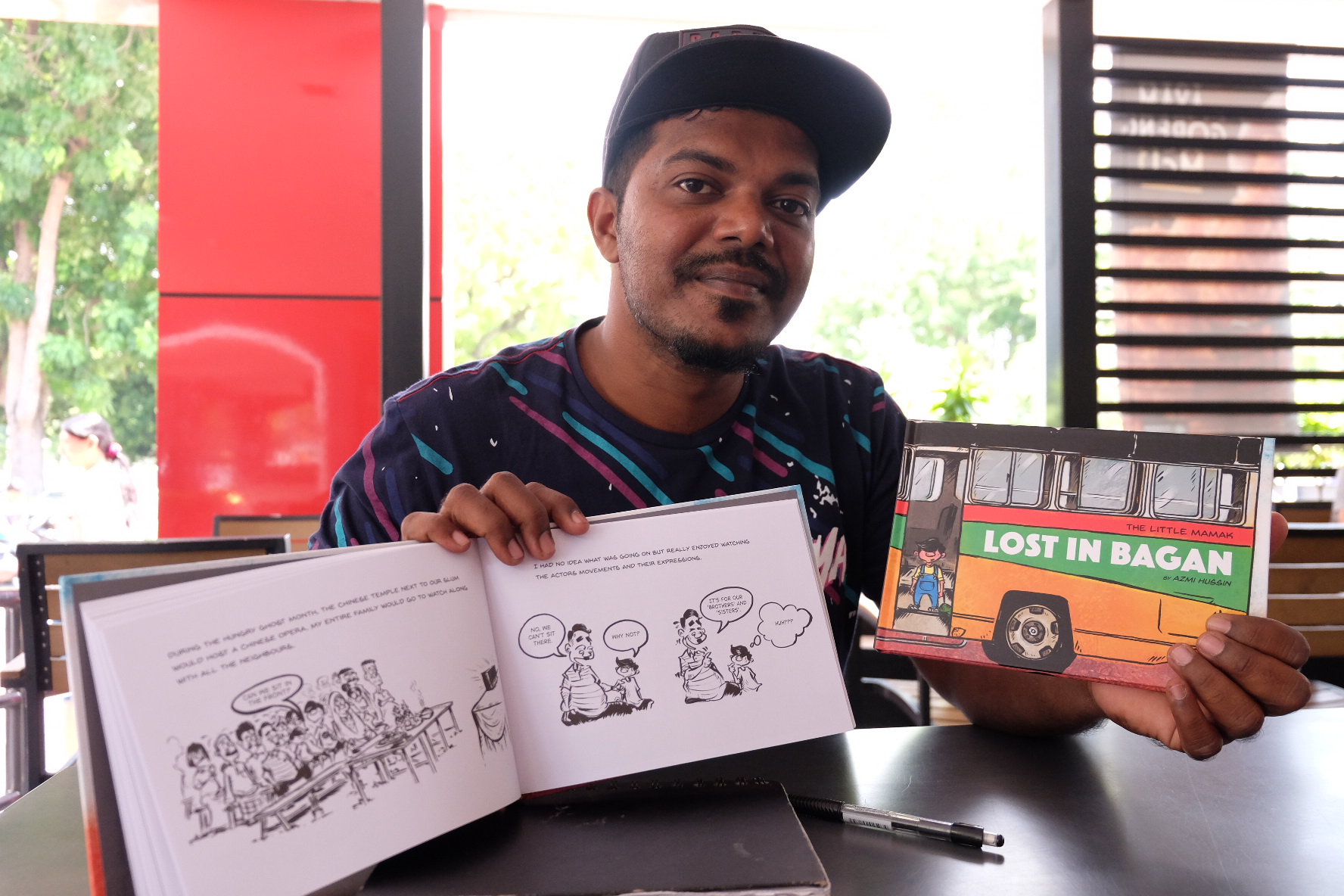 Mohd Azmi with his latest book, Lost in Bagan. u00e2u20acu201d Picture by K.E.Ooi.