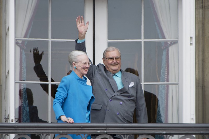 Denmark's Queen Margrethe and Prince Henrik wave from the balcony during Queen Margrethe's 76th birthday celebration at Amalienborg Palace in Copenhagen, Denmark April 16, 2016. u00e2u20acu201d Reuters pic