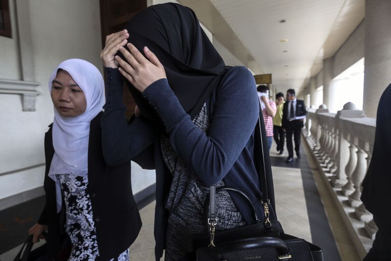 Nor Sabariah Abdul Kadir, 29, is seen outside the Cyber Court at Duta Court Complex in Kuala Lumpur, August 18, 2017.