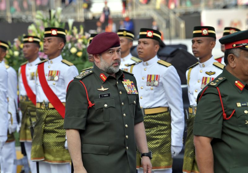 Yang di-Pertuan Agong Sultan Muhammad V inspects the guard of honour during the 60th National Day celebrations at Dataran Merdeka in Kuala Lumpur August 31, 2017. u00e2u20acu2022 Bernama pic