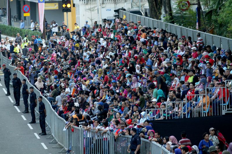 Crowds throng Dataran Merdeka in Kuala Lumpur to catch the 60th National Day celebrations, August 31, 2017. u00e2u20acu2022 Picture by Miera Zulyana