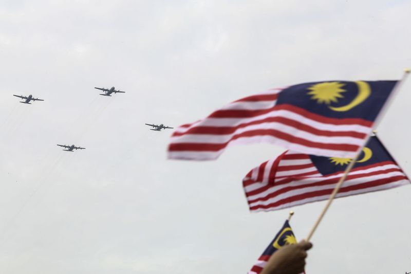 National flags are seen being waved during a rehearsal for the upcoming National Day celebrations at Dataran Merdeka in Kuala Lumpur August 28, 2017. u00e2u20acu2022 Picture by Yusof Mat Isa