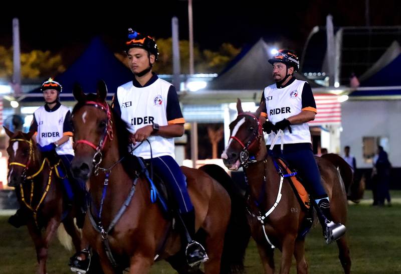 Sultan Mizan Zainal Abidin (right) astride RTES Anniversary, accompanied by Mohd Bulkhari Rozalali and Azizatul Asma Abdullah (left) at Terengganu International Endurance Park, early August 20, 2017. u00e2u20acu201d Bernama pic
