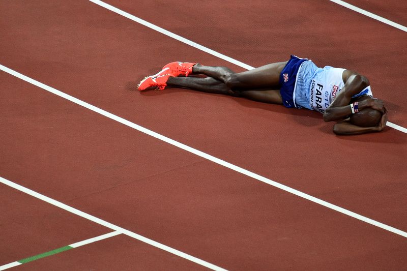 Britainu00e2u20acu2122s Mo Farah reacts after coming in second to take silver in the final of the menu00e2u20acu2122s 5000m athletics event at the 2017 IAAF World Championships at the London Stadium in London on August 12, 2017. u00e2u20acu201d AFP pic