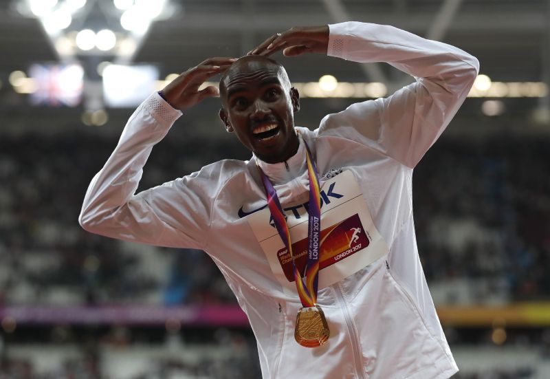 Mo Farah of Britain celebrates after winning the gold medal in the menu00e2u20acu2122s 10,000 metres at the World Athletics Championships in London. u00e2u20acu2022 Reuters pic
