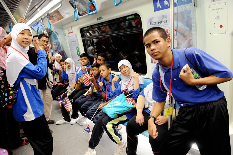 121 students of Sekolah Menengah Kebangsaan Kajang Utama (SMKKU) display excitement when taking an MRT ride during the SMKKU Special Children's Day program at the National Museum Station, August 21, 2017. u00e2u20acu201d Bernama pic