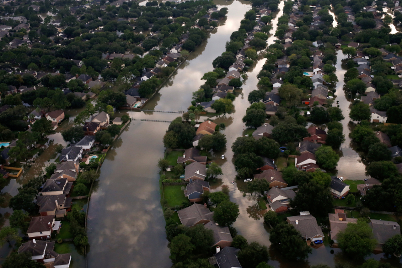Houses are seen partially submerged in flood waters caused by Tropical Storm Harvey in Northwest Houston, Texas August 30, 2017. u00e2u20acu201d Reuters pic