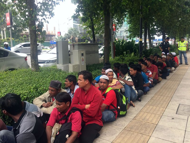 Rohingya workers who tried to join a protest are seen detained under peaceful gathering Act and for documentation purpose, according to police, near the Myanmar embassy in Kuala Lumpur August 30, 2017. u00e2u20acu2022 Reuters pic