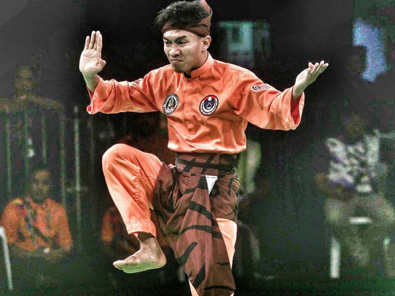 Muhammad Afifi Nordin meraih emas apabila menang kategori Seni Tunggal Putera u00e2u20acu201d Foto ihsan Twitter/MYTeamMas