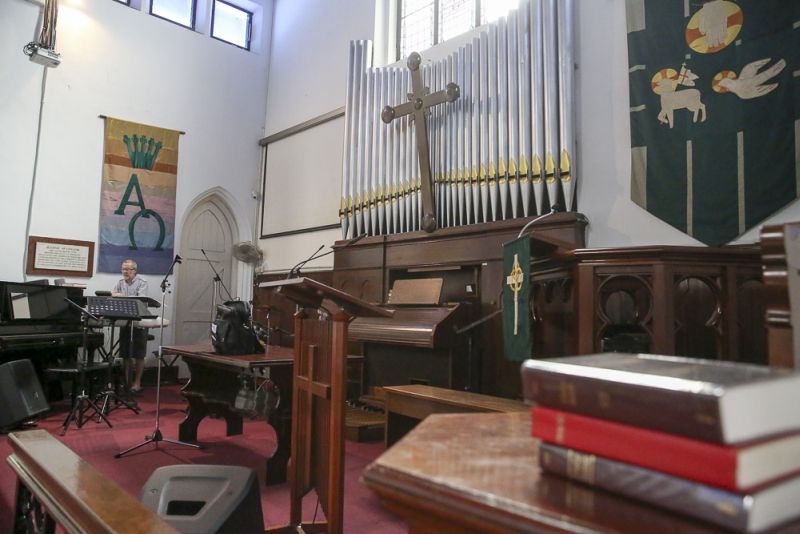The pipe organ became the first to be fully local-made in 1948 when St Andrew's replaced the original UK-cast pipes that were looted, while the sole memorial tablet that survived the looting can be seen mounted on the left wall. ― Picture by Choo Choy May