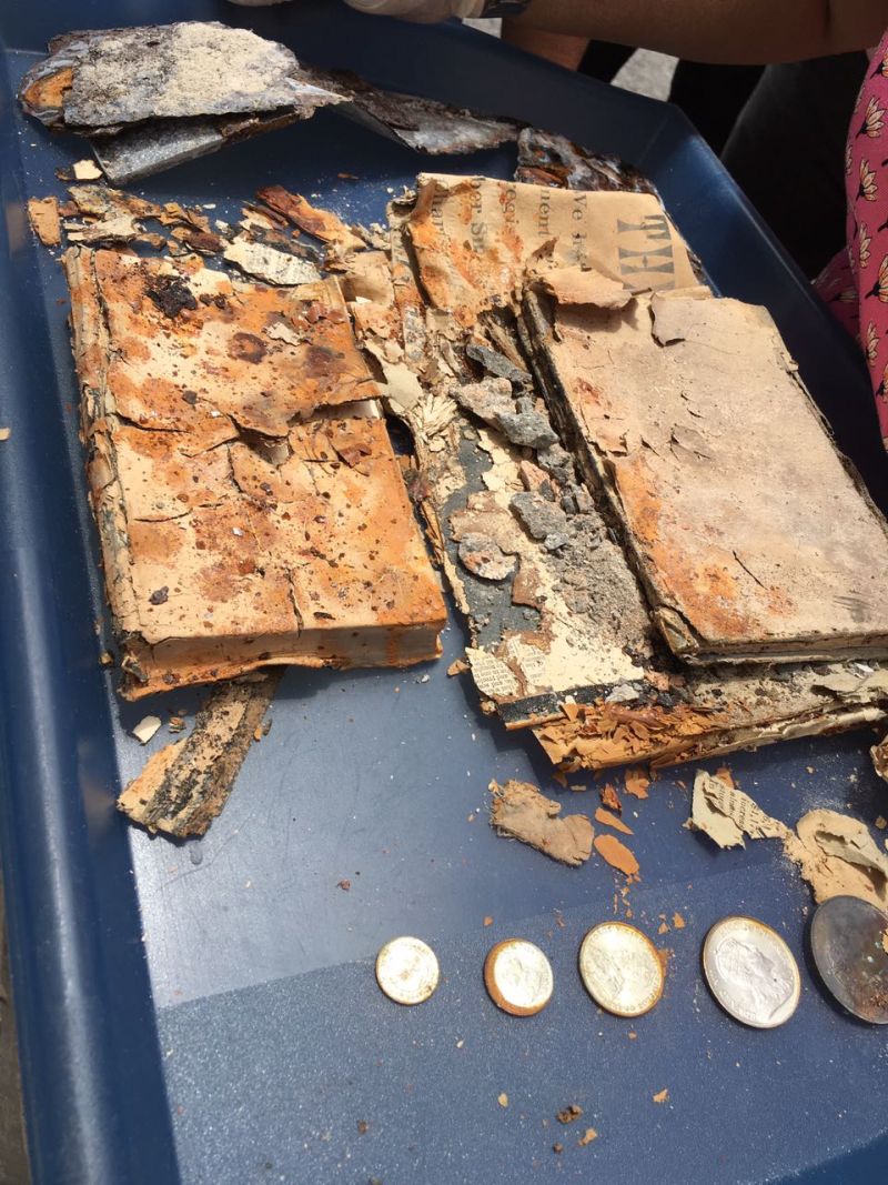The contents of the time capsule including five coins that were then in use in the Federated Malay States that included Selangor. ― Picture courtesy of St Andrew's Presbyterian Church