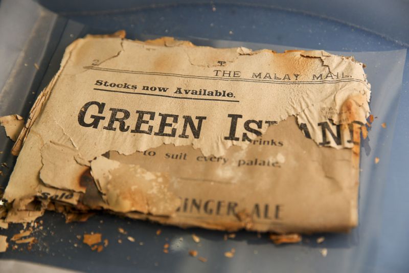 Seen here is the Malay Mail newspaper dated October 3, 1917. Parts of it have disintegrated and crumbled. ― Picture by Choo Choy May