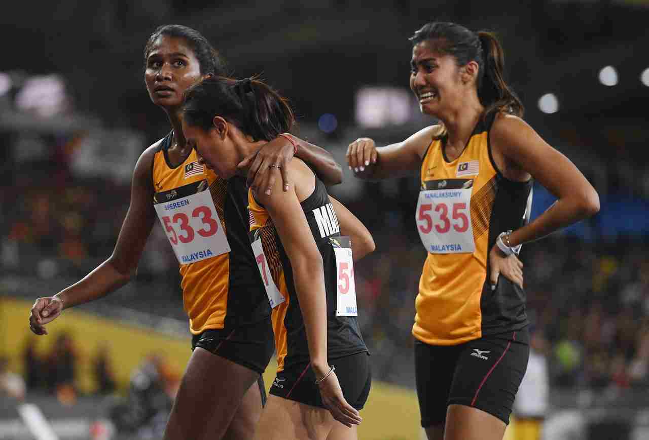 Three of Malaysia's quartet (from left) Shereen Samson Vallabuoy, Fathin Faqihah Mohd Yusuf and Tanalaksiumy Mahenthiran Rayer look dissappointed with the bronze in the women's 4x400m at the Bukit Jalil National Stadium August 26, 2017. u00e2u20acu201d Bernama picn